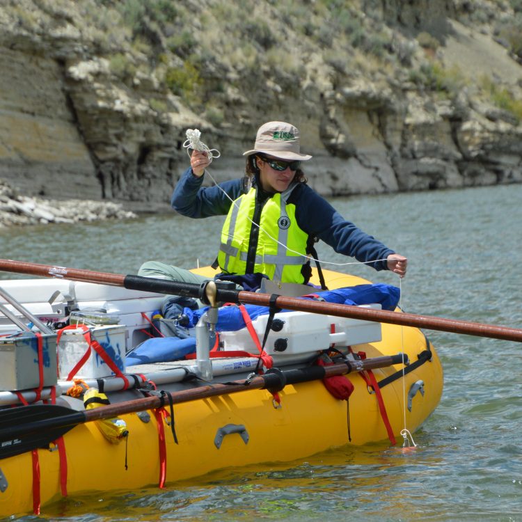 Photo of scientist in raft