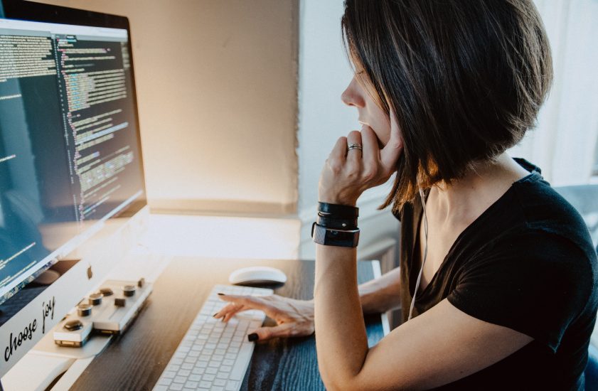 Femalw scientist sitting at computer