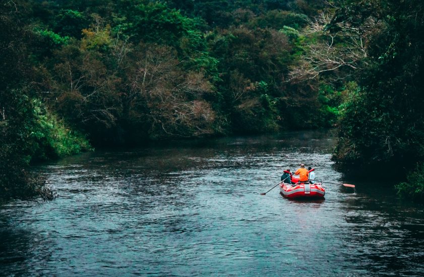 Photo of people rafting down river