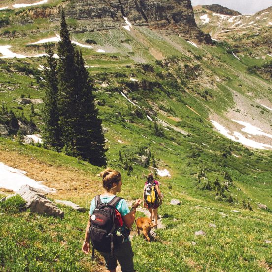 Photo of people hiking in mountains